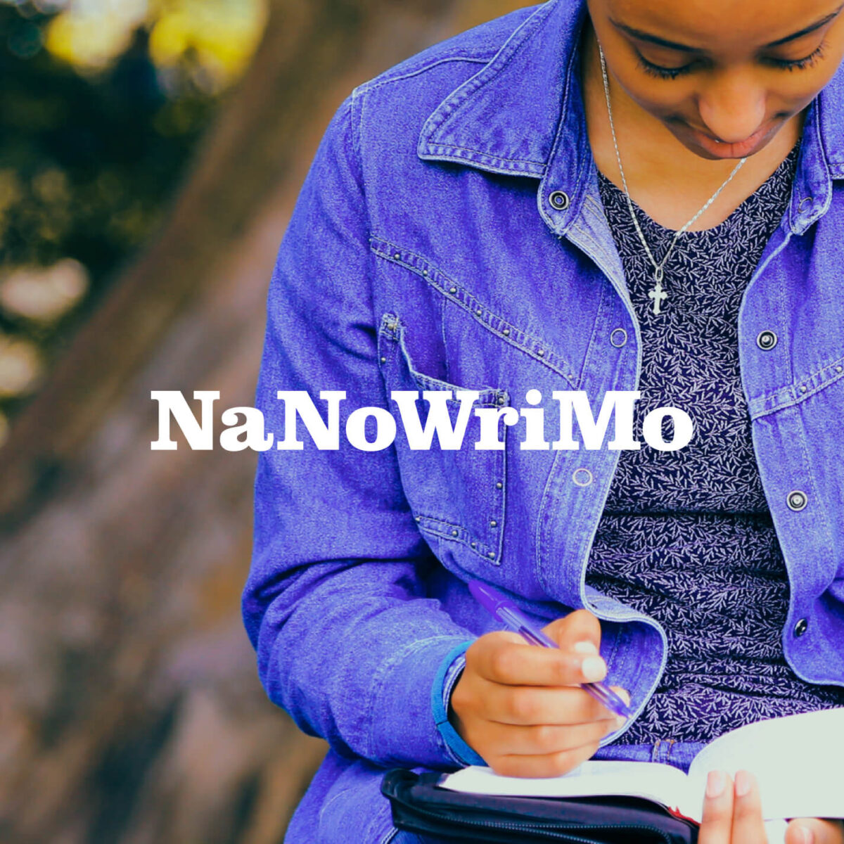 NanoWriMo Logo with Girl Writing