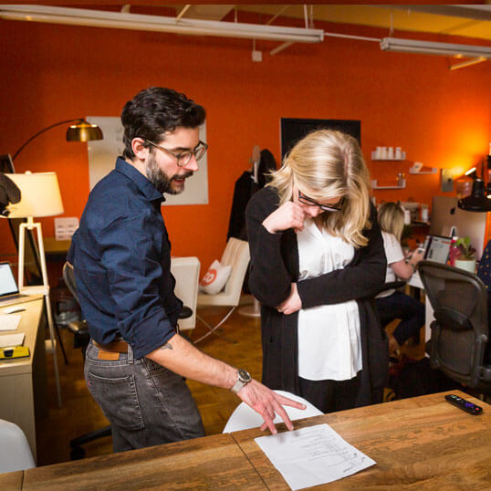 Sinan Imre and Tamara Olson reviewing schedule
