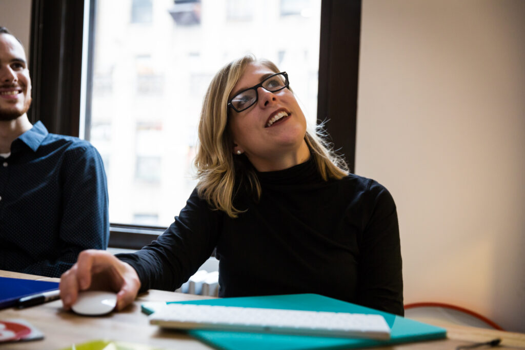 Tamara looking up at screen